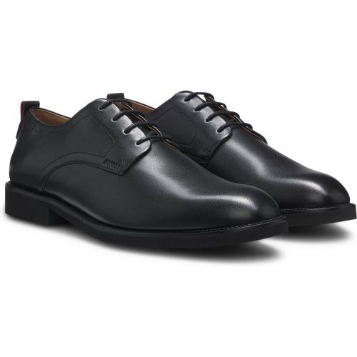 Chaussures derby en cuir avec logo en relief - HUGO - Modalova