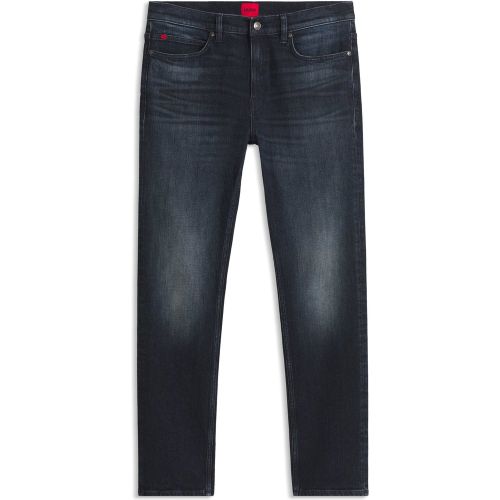 Jean Slim en denim stretch au délavage vintage - HUGO - Modalova