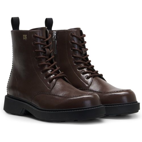 Bottines en cuir à lacets avec logo en creux - HUGO - Modalova