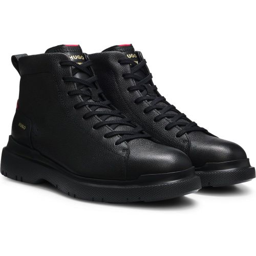 Bottines en cuir grainé avec logo en relief - HUGO - Modalova