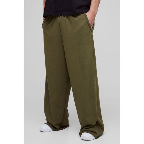 Jogging large à bords bruts - kaki - M - Un look athlétique avec des joggings coupe large. Si vous recherchez des tenues athlétiques offrant plus d - CMM04797-135-56 - Modalova