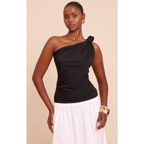 Black Top Fluide Tissé Asymétrique À Détail Nœud Sur L'épaule | Taille 32 - PrettyLittleThing - Modalova