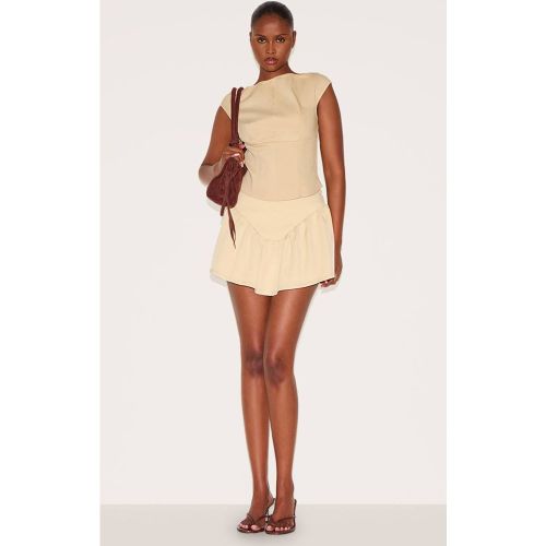 Mini Jupe Structurée Évasée À Taille Échancrée | Taille 32 - PrettyLittleThing - Modalova