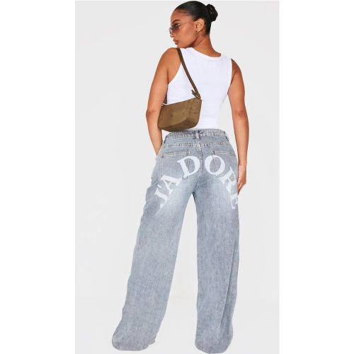 Jean Denim Taille Basse Coupe Large Imprimé Jadore Délavé Shape | Taille 42 - PrettyLittleThing - Modalova
