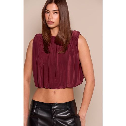 Plum Haut En Tissu Slinky À Ourlet Bouffant Et Détail D'épaules | Taille 42 - PrettyLittleThing - Modalova