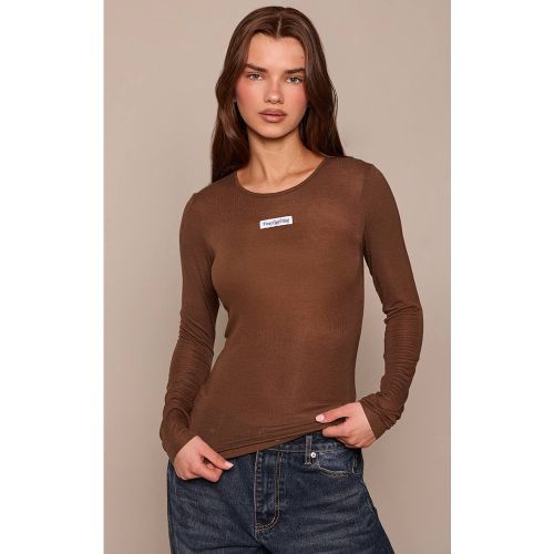 T-shirt À Manches Longues En Coton Transparent Avec Détail D'étiquette | Taille 42 - PrettyLittleThing - Modalova