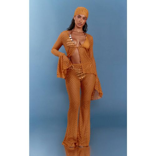 Mustard Pantalon De Plage Évasé Taille Basse En Jersey Texturé Transparent | Taille XS - PrettyLittleThing - Modalova