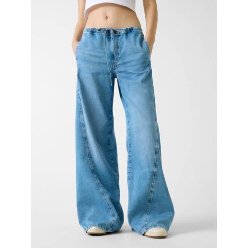 Jean Jogger Taille Basse Extra-Larges À Jambe Torsadée - Guess - Modalova