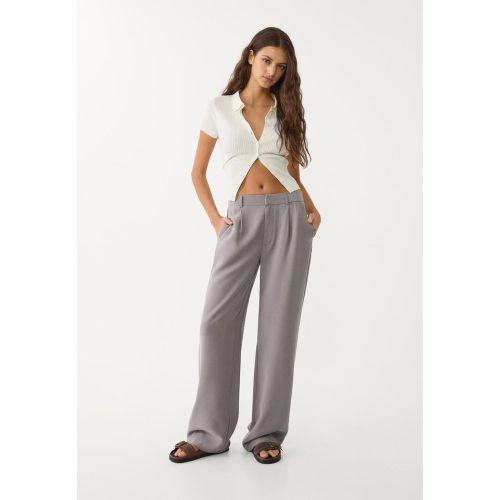 Pantalon droit fluide à pinces 32 - Stradivarius - Modalova
