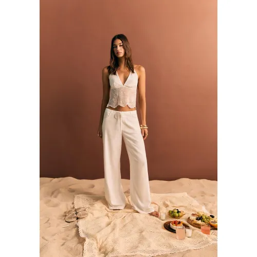 Pantalon fluide à poches Écru 32 - Stradivarius - Modalova