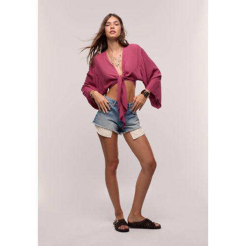 Blouse fluide à nœud XS - Stradivarius - Modalova