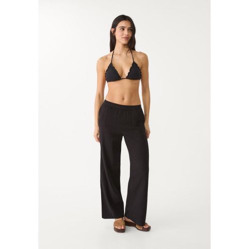 Pantalon fluide à ceinture élastique XS - Stradivarius - Modalova