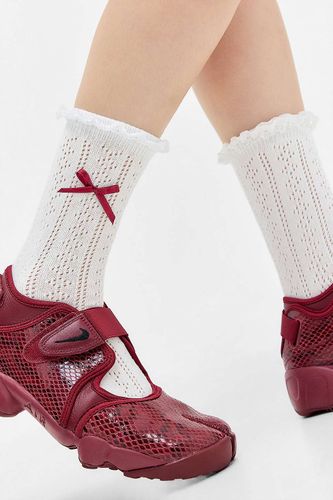 Chaussettes à naud en pointelle en taille: TAILLE UNIQUE - Out From Under - Modalova