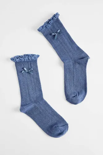 Chaussettes à naud en pointelle en taille: TAILLE UNIQUE - Out From Under - Modalova