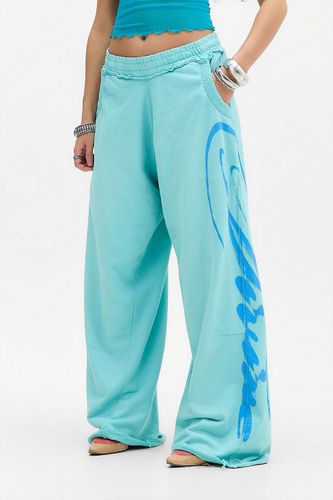 Pantalon de jogging large Divine Airbrush bleu en taille: Small - Jaded London - Modalova