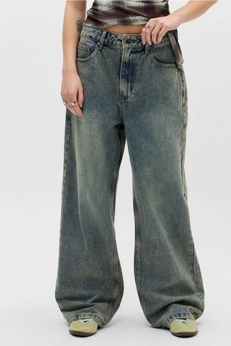 Jean Dragon délavé exclusif UO en taille: XS - Ed Hardy - Modalova