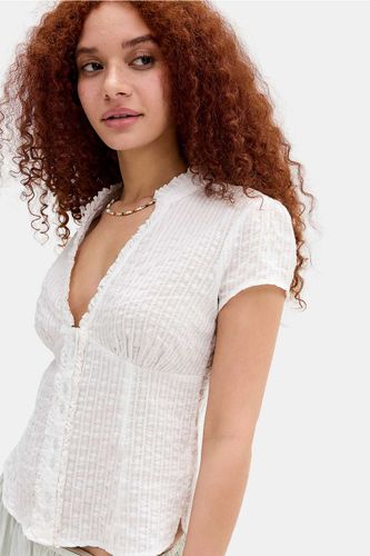 Blouse à volants Tara en taille: Small - Kimchi Blue - Modalova
