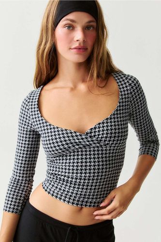Haut Bec à encolure croisée à manches 3/4 en taille: XS - Out From Under - Modalova