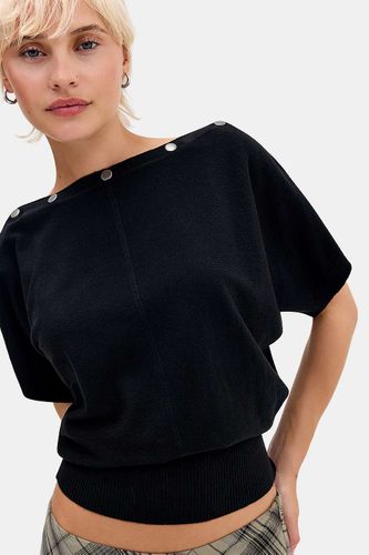 Haut manches chauve-souris courtes à boutons pression UO par en taille: XS - Urban Outfitters - Modalova