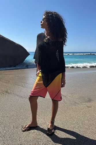 Cape tricotée UO par en taille: XS - Urban Outfitters - Modalova
