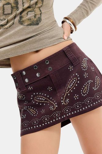 Mini-jupe en denim cloutée Backstage en taille: XS - BDG - Modalova