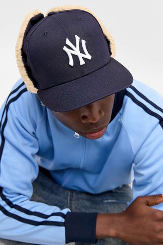 Casquette UO Exclusive NY Yankees Borg à oreilles de chien bleu marine en taille: Small/Medium - New Era - Modalova