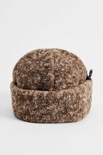 Chapeau Docker en fausse fourrure UO par en taille: TAILLE UNIQUE - Urban Outfitters - Modalova