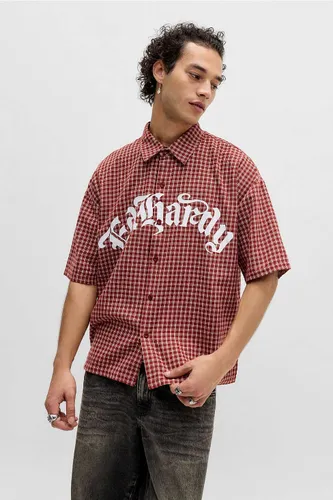 Chemise ample à carreaux rouge Exclusivité UO en taille: Small - Ed Hardy - Modalova