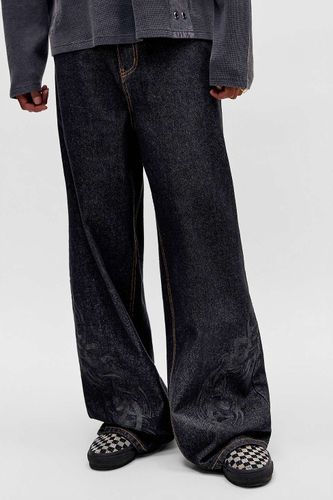 Jean noir tatouage UO Exclusif en taille: 30 l 30 L - Ed Hardy - Modalova