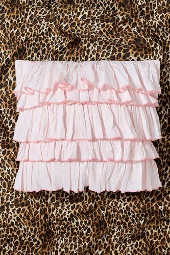 Coussin rose à volants par en Rose Vif taille: TAILLE UNIQUE - Urban Outfitters - Modalova