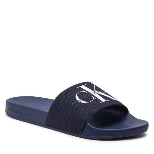 Mules / sandales de bain Calvin Klein Jeans Slide Monogram Co YM0YM00061 Navy 0GY - Chaussures.fr - Modalova