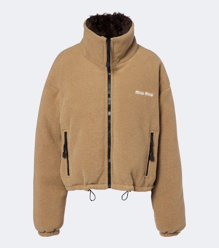 Miu Miu Veste doudoune à logo - Miu Miu - Modalova