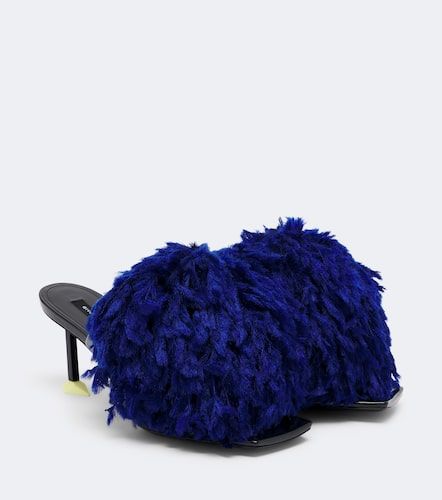 Mules en cuir verni à pompons - Givenchy - Modalova