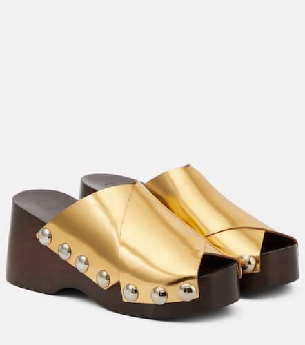 Mules en cuir métallisé à ornements - Ganni - Modalova
