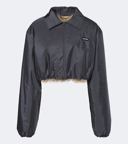 Veste blouson courte doublée de shearling - Miu Miu - Modalova