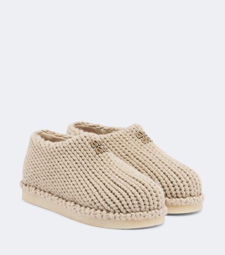 Miu Miu Chassures slip-on à logo - Miu Miu - Modalova