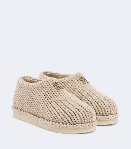Miu Miu Chassures slip-on à logo - Miu Miu - Modalova