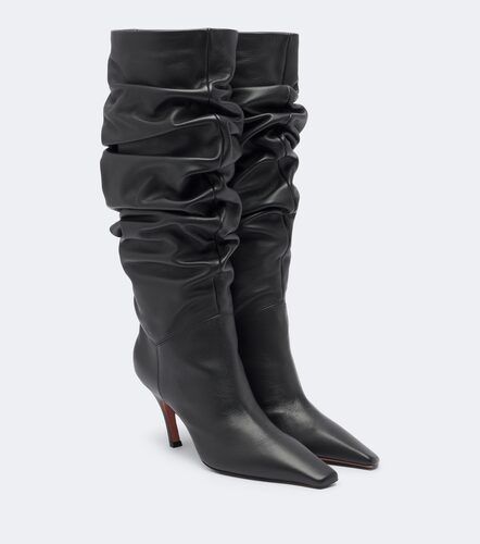 Amina Muaddi Bottes Jamie en cuir - Amina Muaddi - Modalova