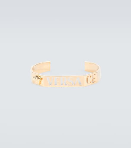 Versace Bracelet jonc à logo - Versace - Modalova