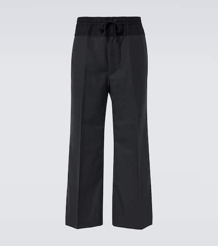 Pantalon ample rayé en laine - Junya Watanabe - Modalova