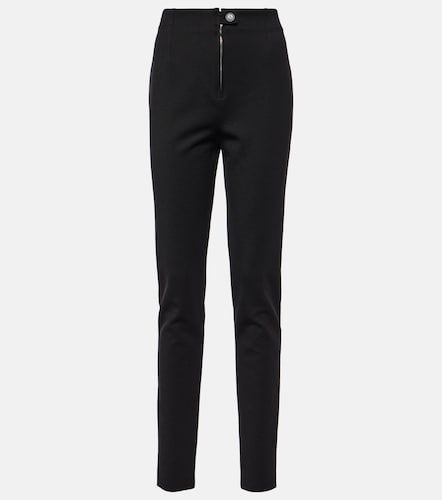 Alaïa Leggings taille haute en gabardine - Alaia - Modalova