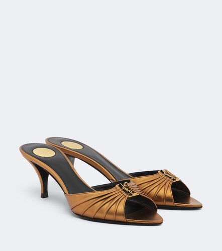 Mules Babylone Cassandre en cuir métallisé - Saint Laurent - Modalova