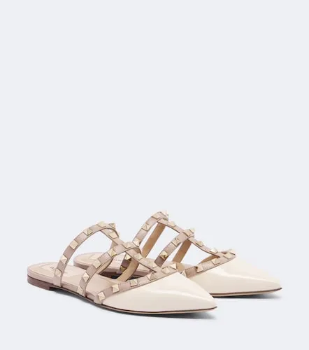 Mules Rockstud en cuir verni - Valentino Garavani - Modalova
