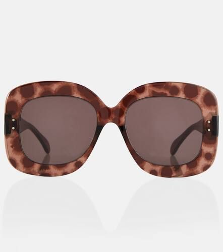Alaïa Lunettes de soleil oversize - Alaïa - Modalova