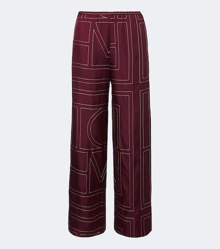 Pantalon ample Monogram en soie à broderies - Toteme - Modalova