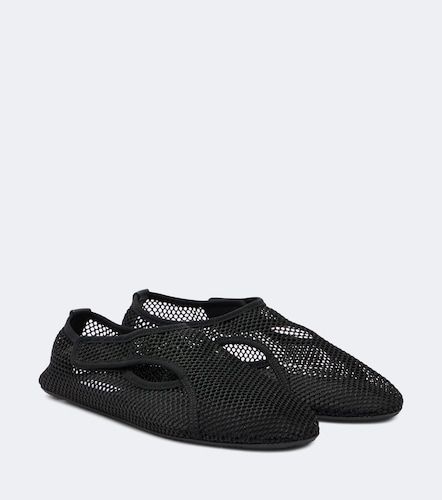 Alaïa Slip-on en résille - Alaia - Modalova