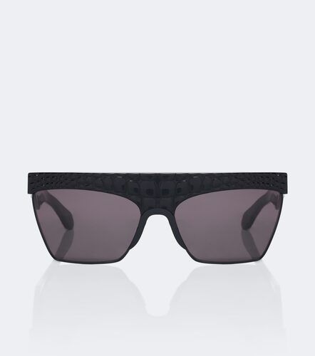Alaïa Lunettes de soleil à effet croco - Alaia - Modalova