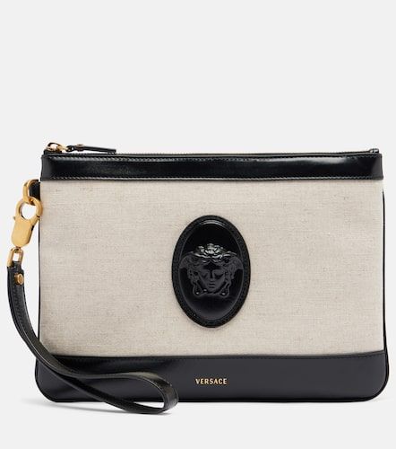 Pochette Rivière en toile à finitions en cuir - Versace - Modalova