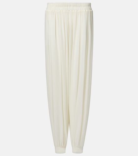 Alaïa Pantalon ample en soie mélangée - Alaia - Modalova
