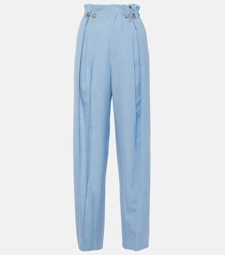 Pantalon tapered en laine vierge - Victoria Beckham - Modalova